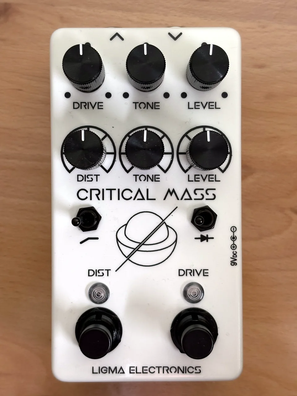 White Critical Mass dual drive pedal photographed from above